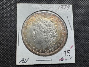 lot 15 image: 1879 Morgan Silver Dollar Marked AU When Purchased