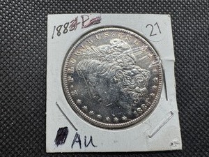 lot 21 image: 1884 Morgan Silver Dollar Marked AU When Purchased