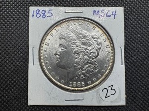 lot 23 image: 1885 Morgan Silver Dollar Marked MS64 When Purchased