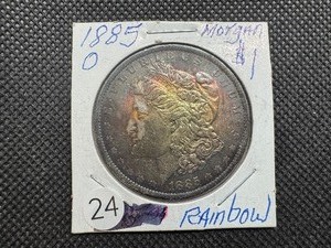 lot 24 image: High Grade 1885-O Rainbow Toned Morgan Silver Dollar - Beautiful Coin, Looks Better in Hand