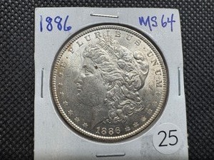 lot 25 image: 1886 Morgan Silver Dollar Marked MS64 When Purchased