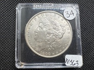 lot 34 image: 1900 Morgan Silver Dollar Marked MS63 When Purchased