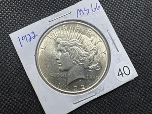 lot 40 image: 1922 Peace Silver Dollar Marked MS66 When Purchased - Great Detail and Nice Mint Luster