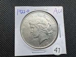 lot 41 image: 1922-D Peace Silver Dollar Marked AU When Purchased