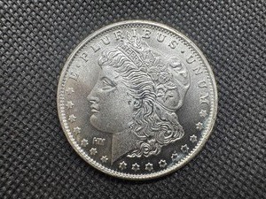 lot 79 image: BU One Ounce .999 Silver Morgan Round