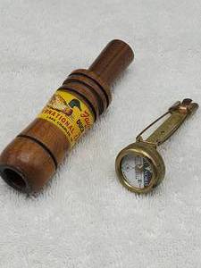 lot 58 image: Vintage Faulks WA-33 Duck Call & Tru Nord Pin-On Compass 