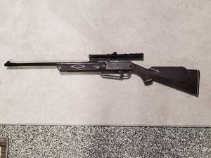 lot 62 image: Daisey Powerline 880 .177 BB Gun with Daisy 4X Scope, works perfectly