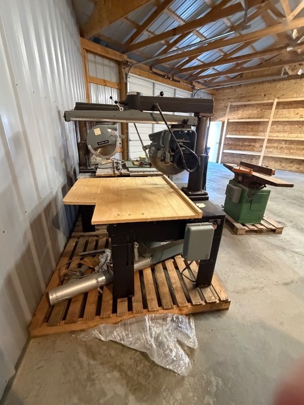 lot 7 image: Delta Radial Arm Saw with Table and Accessories