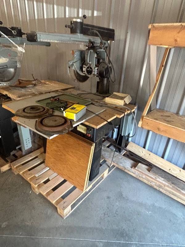lot 7 image: Delta Radial Arm Saw with Table and Accessories