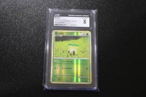 lot 49 image: 2010 Pokemon HeartGold & SoulSilver Reverse Holo Sunkern #85123 CGC 8