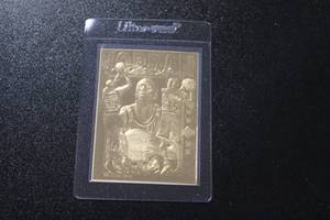 lot 119 image: Upper Deck 23K Gold Triple Image Michael Jordan Basketball Card 50000