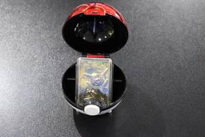 lot 130 image: 1999 Burger King 23K Gold Pikachu Metal Card w Pokeball