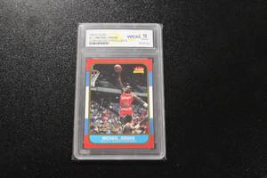 lot 151 image: 1996-97 Fleer Ultra Decade of Excellence Michael Jordan #U-4 WCG 10 Rookie Reprint