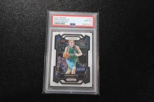lot 160 image: 2023-24 Prizm White Dirk Nowitzki #187 PSA 8 36175  Only 175 Exist
