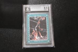 lot 183 image: 1997-98 SP Authentic Tim Duncan #165 BGS 8.5 Rookie Card
