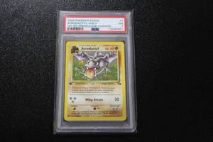 lot 201 image: 1999 Pokemon Fossil 1st Edition Aerodactyl Holo Prerelease #1 PSA 7