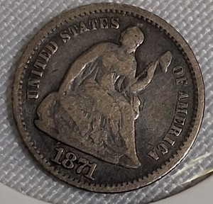 lot 29 image: 1871 Seated Liberty Half Dime, Type 4, with the legend on the obverse.