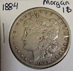 lot 63 image: 1884 Morgan Silver Dollar
