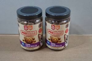 lot 31 image: 2 Boss DogCat Pro Balls Pet Treats - Pork