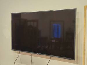LG 55" Wall Mount Flatscreen TV with Wall Mount and Remote Control