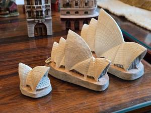 lot 857 image: Lot of (3) Hand Made and Hand Painted Replicas of the Sydney Opera House Australia by Patrick Gates by Studios and Workshops of John Hine (Hampshire England)