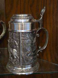 lot 868 image: Vintage 8 Hunting theme Pewter German Beer Stein