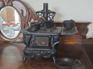 lot 919 image: Vintage Miniature Doll House Cast Iron Stove with Cast Iron Pots and Pans by Crescent