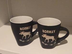 lot 1008 image: Lot of (2) Moose and Tracks theme Ceramic Coffee Mugs (Norway)