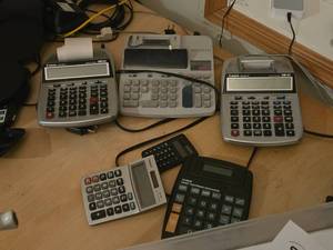lot 1047 image: Lot of (6) Desk Calculators - Canon Paper Printers P23-DHV (x2), Casio, Texas Instruments TI-5045SV,