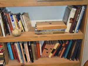 lot 1038 image: Lot of (1 Shelf) - Monet, Brain, Various Dolls, Mysterious Places, Alfred Hitchcock Books