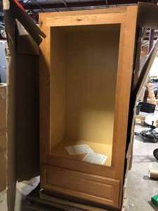 lot 28 image: Wooden Oven kitchen Cabinet  Customer Returns See Pictures