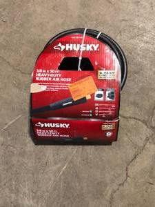 lot 35 image: Husky 38 in. x 50 ft. Heavy-Duty Rubber Hose   Customer Returns See  Pictures