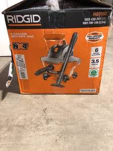 lot 48 image: RIDGID 6 Gal. 3.5 Peak HP NXT Shop Vacuum Wet Dry Vac with General Debris Filter, Locking Hose and Attachments HD0600 Customer Returns See  Pictures