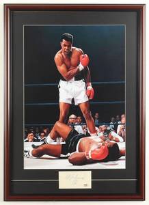lot 34 image: Muhammad Ali Signed Custom Framed Cut Display with Art Print (PSA)
