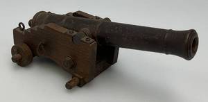 lot 112 image: EST. $125.00-$225.00 Miniature Cast Iron Black Powder Signal Cannon (Missing Wheels) 7 12