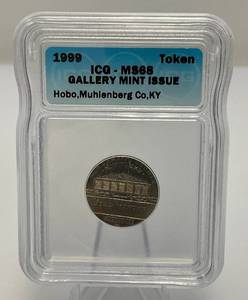 lot 137 image: 1999 Token ICG-MS68 Gallery Mint Issue  Hobo,Muhienberg Co, Ky In Sealed Case