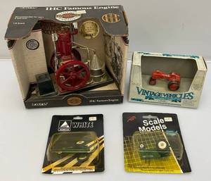 lot 140 image: Misc. Miniature Die-Cast Collectibles Including ERTL Special Edition IHC Fgamous Engine, Allis Chalmers Model C Tractor And More (New Old Stock)