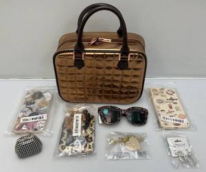 lot 143 image: Misc. Jewelry, Phone Cases And Makeup Case (Most New)