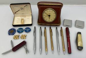 lot 184 image: Misc. Vintage Collectible Items Including Gilbert Travel Clock, Pens, Pocket Knives And More