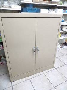 lot 22 image: Metal 2-Door Cabinet. 36x18x42
