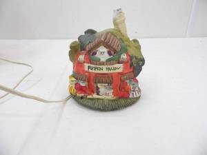 lot 111 image: Pumpkin Hollow Porcelain Lighted Halloween Pumpkin House
