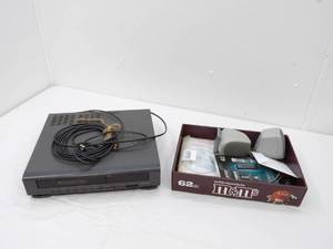 lot 62 image: Daewoo VHS Player, Microsoft Works 2000, Computer Speakers, Jump Drive and more