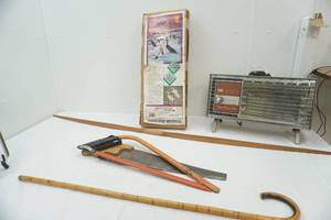 lot 155 image: North Winds snow goose Decoys, Arwin heater, Cane, Bow, Bow saw ,Hand saw