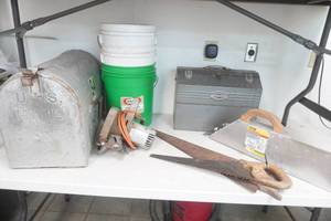 lot 178 image: Large Farm Mailbox, Metal Tool Box with Tools, Vintage Hand Saws, Circular Saw, 5 gallon buckets
