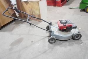 lot 184 image: Craftsman gas-powered, self-propelled walk-behind lawn mower.