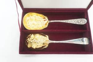 lot 203 image: American Silversmiths Collection by Godinger USA. Silver-plated Berry Serving Spoons with a gold wash.