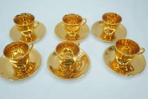 lot 213 image: Vintage Gold-Gilt Footed Tea Cup and Saucer Set