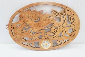 lot 234 image: Wooden Mermaid Clock 14.5 long by 9.5