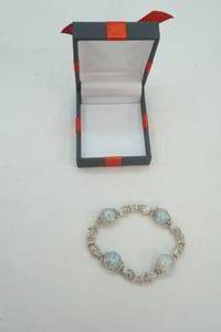 lot 248 image: Jewelry Lot Stretch Bracelet featuring glass floral beads