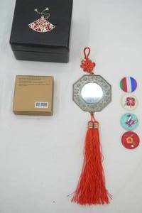 lot 262 image: Chinese Feng Shui Bagua Mirror wred tassel and decorative pins